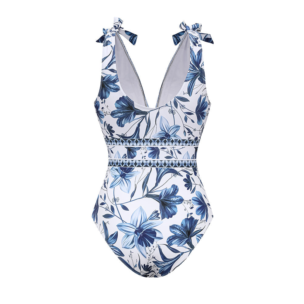 Traje de baño de una pieza con escote en V y falda integrada