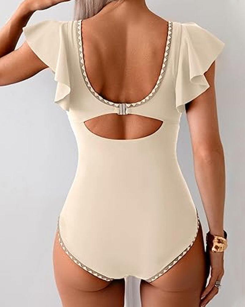 Traje de baño de una pieza con estampado, volantes y control de abdomen, manga corta y escote en V profundo