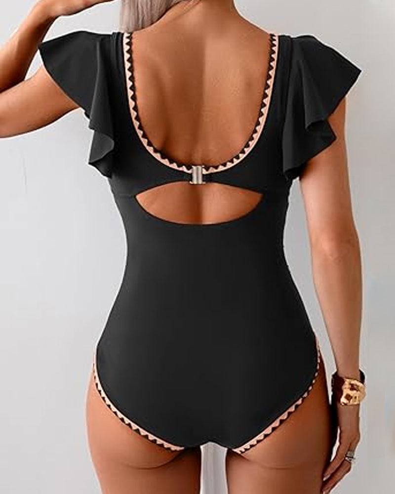 Traje de baño de una pieza con estampado, volantes y control de abdomen, manga corta y escote en V profundo