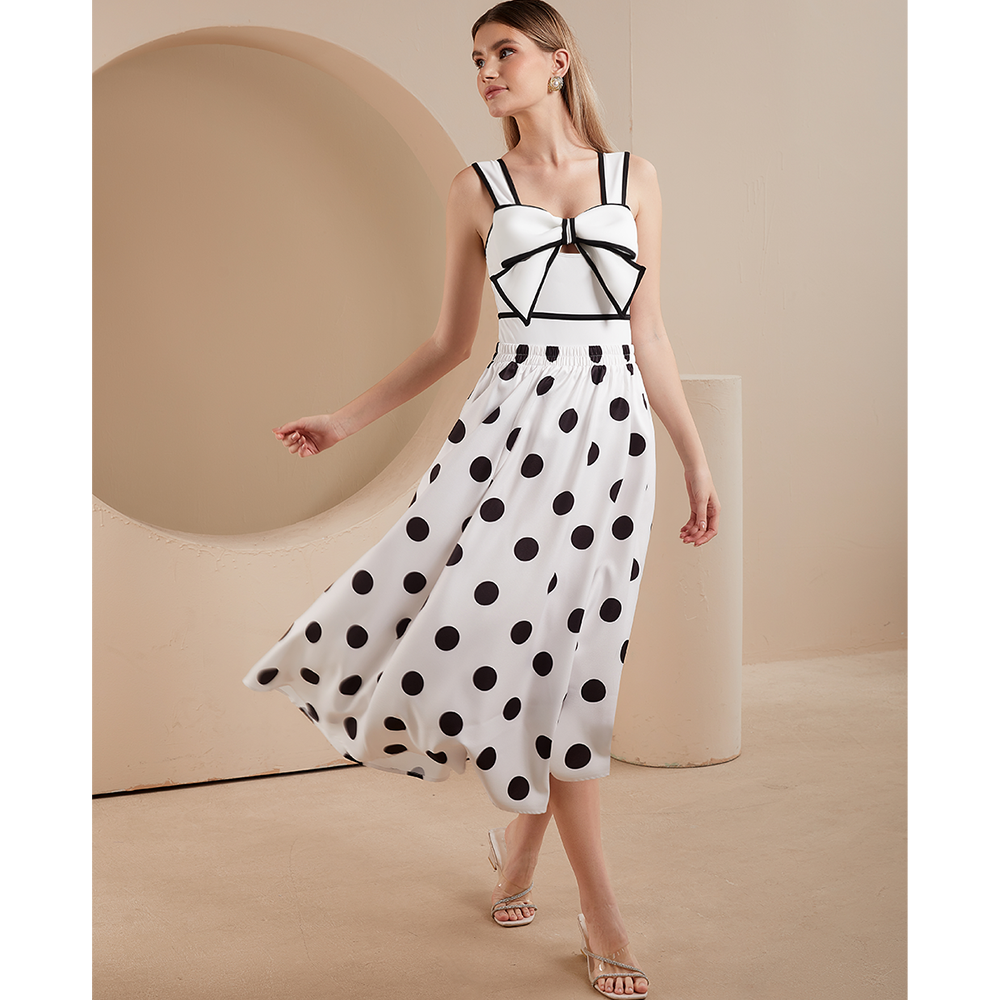 Conjunto de baño de una pieza con falda y diseño de lazo en blanco y negro